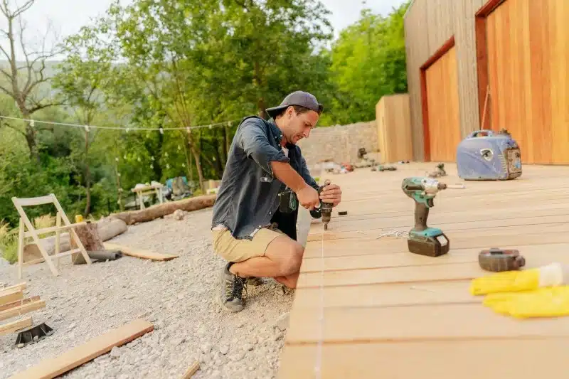 A contractor building a custom deck in St. Louis, MO